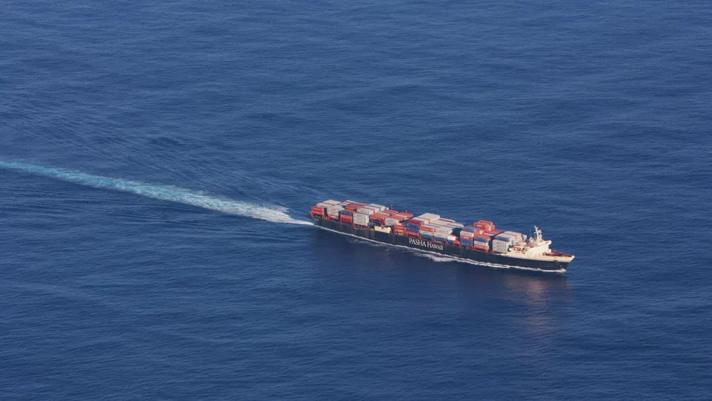 Aerial view of a container ship crossing the open ocean